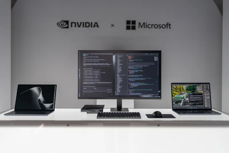 A dual-monitor developer workstation on a lit white plinth beneath the NVIDIA and Microsoft lockup.