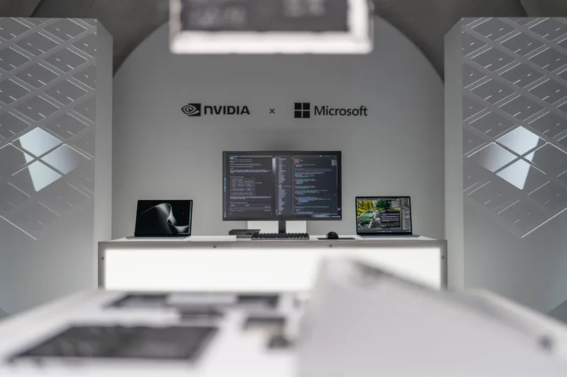 The briefing room at an angle, device panels suspended above the workstation plinth.
