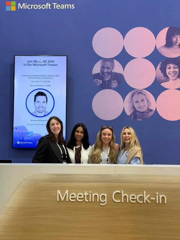 The team at the Microsoft Teams meeting check-in desk on the show floor.